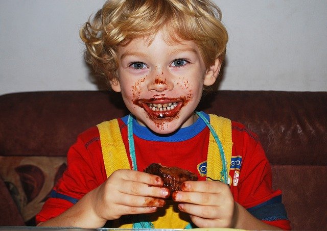 boy eating chocolate